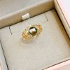 Bague or 750/1000e ajourée Perle de Tahiti “Myriade” diamantée