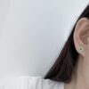 boucle d'oreille tige en platine  diamant et jadeite 
