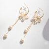 Boucle d'oreille pendante avec perle de culture et creation petire perle 