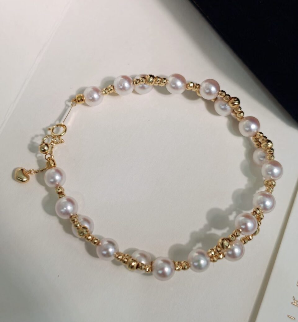 Bracelet avec 19 perles Akoya AAA et or jaune 750/1000e